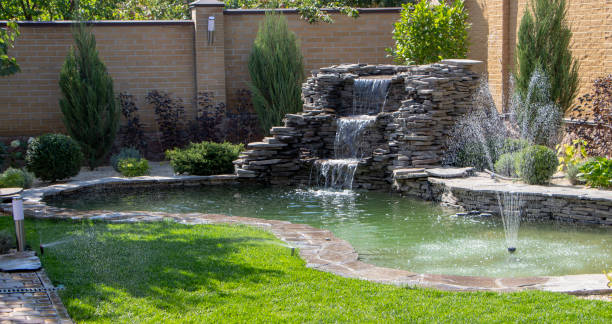 istock fountain with two overflows, in antique style. Using natural materials such as wild marble, slate, granite and basalt 1034485148