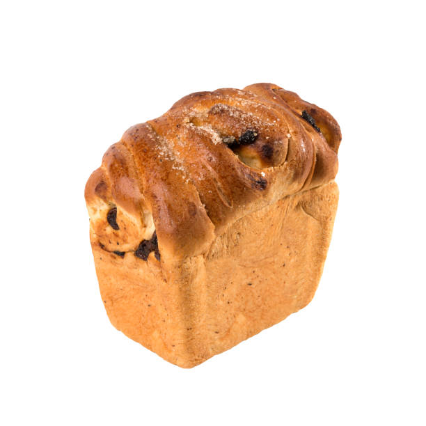 istock Sweet white bread with raisins isolated on white background 1034486014