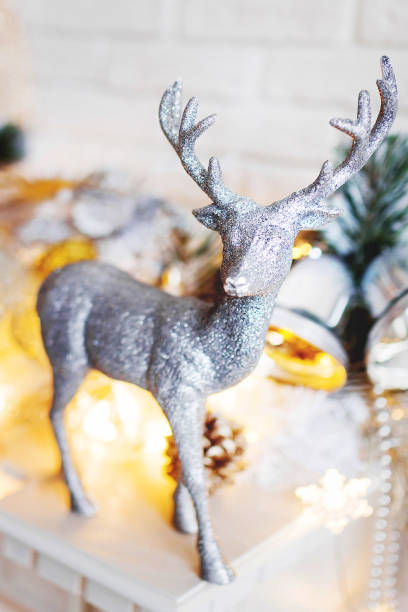 istock Christmas and New Year decorations with silver deer. Holiday winter background. 1034487508