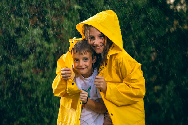 istock Little girl playing out in the rain 1034511282