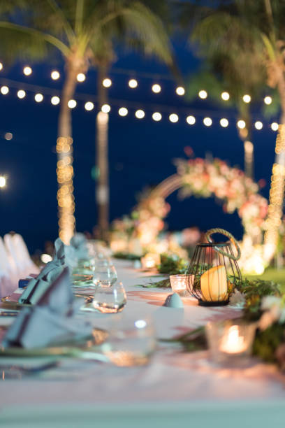 istock Dining table decorated with beautiful candles at the wedding ceremony. 1034515344