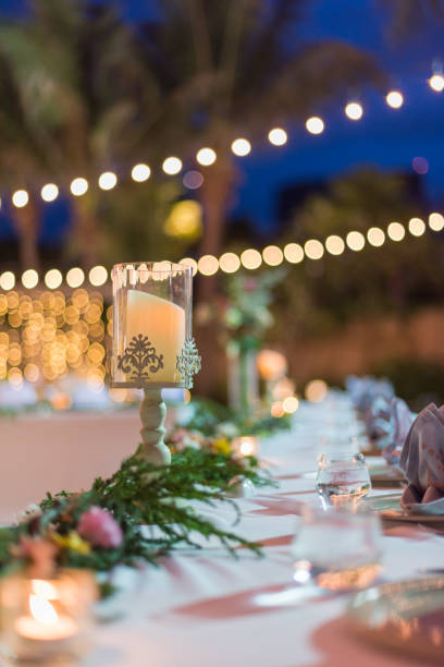 istock Dining table decorated with beautiful candles at the wedding ceremony. 1034515596