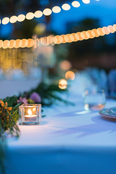 istock Dining table decorated with beautiful candles at the wedding ceremony. 1034515642