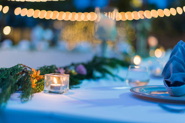 istock Dining table decorated with beautiful candles at the wedding ceremony. 1034515672