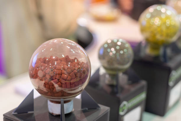 Various granules and powders in clear glass capsules.