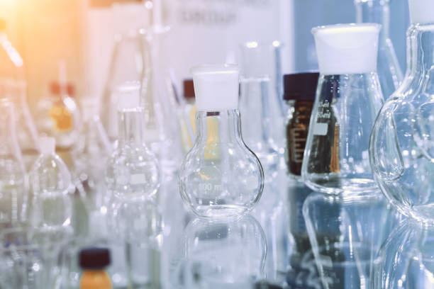 istock Chemical laboratory glassware. Abstract background. 1034522218