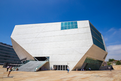Image taken of tourists outside the casa de musica in Porto, taken in the summer of 2012.\n\nPorto is the second-largest city in Portugal after Lisbon and one of the major urban areas of the Iberian Peninsula.