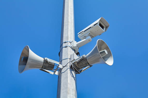 istock Taffic control surveillance cameras CCTV  mounted over highway road. 1034529478
