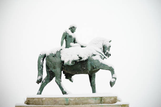 Lady Godiva under snow in Coventry City Centre, West Midlands, UK Lady Godiva under snow in Coventry City Centre, West Midlands, UK coventry godiva stock pictures, royalty-free photos & images