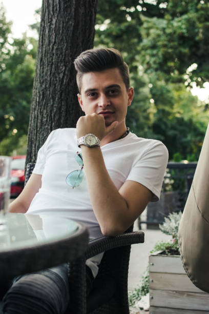 istock Happy man at coffee shop 1034533542