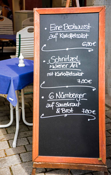 istock Hand written restaurant menu on chalkboard in Germany 1034533802