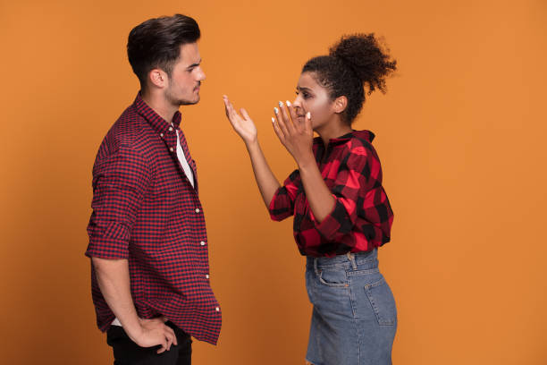 istock Young mixed race couple arguing. 1034537728