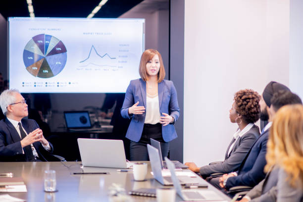 istock Woman gives a presentation on numerical figures 1034539448