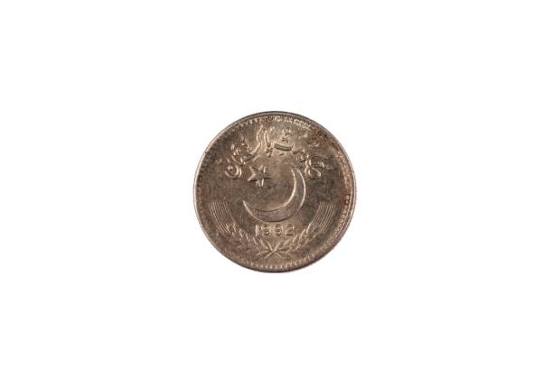 istock Old Pakistani Twenty Five Rupee Coin Isolated On white 1034549400