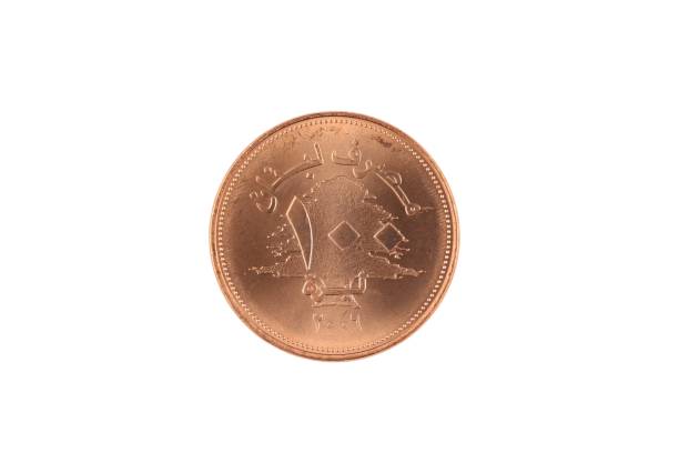 istock Lebanese 100 livres coin isolated on white 1034549408