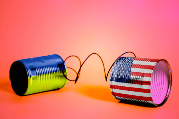 istock tin can phone with USA and Ukraine Flags. communication concept 1034556286
