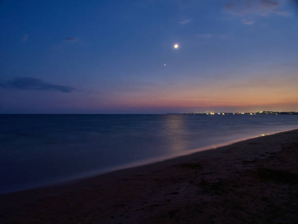 istock Long exposure at Granelli beach at night during summer. Sicily, Italy 1034566664