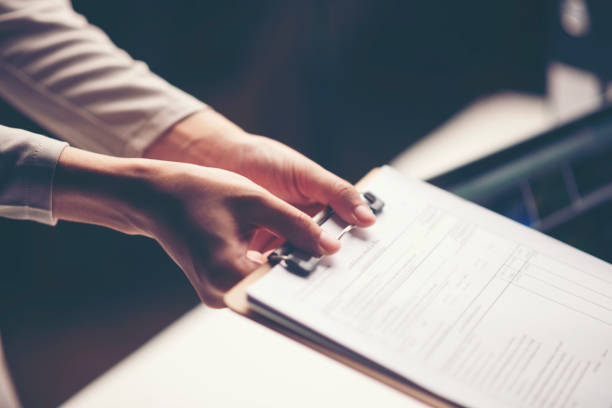 istock business document in hand of businessman 1034583998