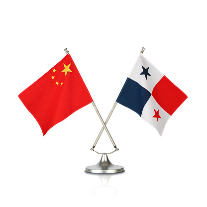 Two crossed national flags on white background