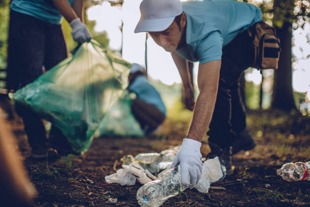 istock Volunteers in public park 1034595246