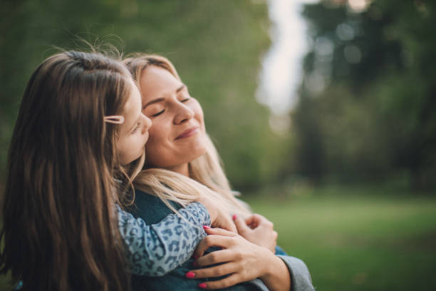 istock Mother and daughter embracing 1034615406