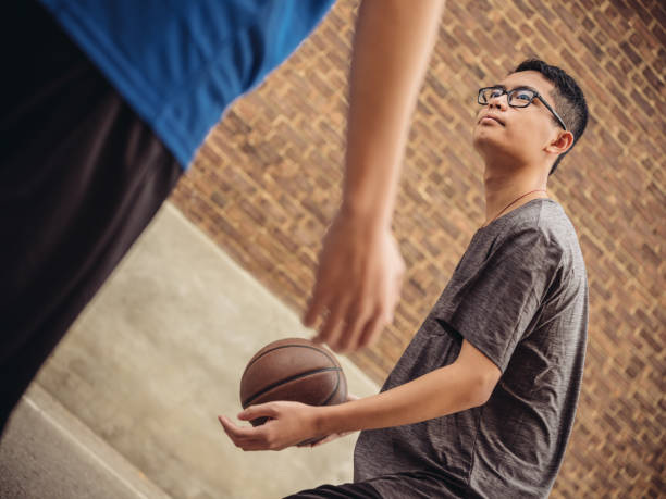 istock Twins at basketball 1034623208