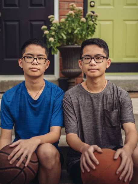 istock Twins at basketball 1034623330