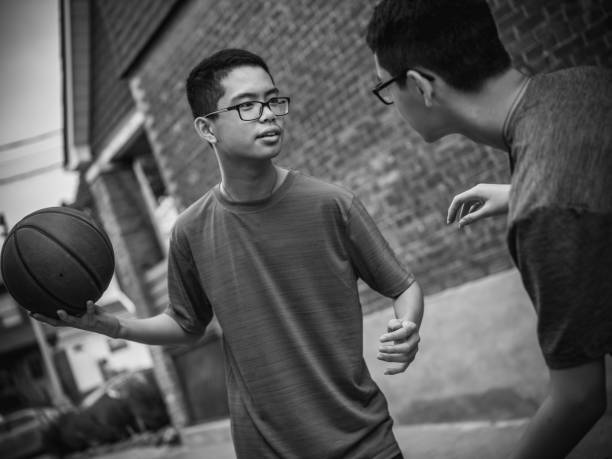 istock Twins at basketball 1034623370