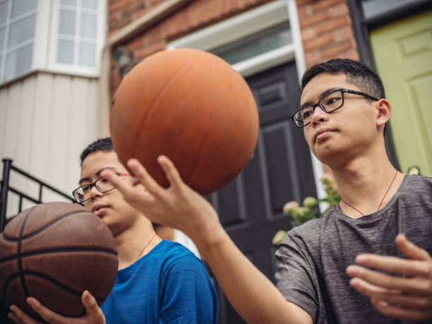 istock Twins at basketball 1034623398