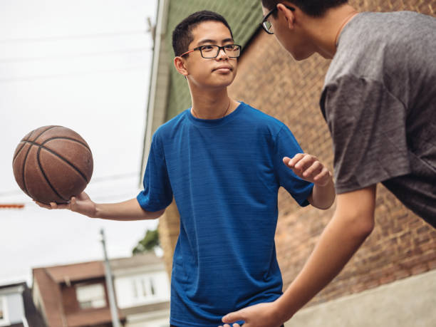 istock Twins at basketball 1034623434