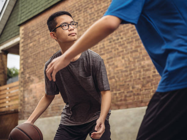 istock Twins at basketball 1034623462