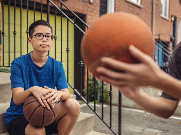 istock Twins at basketball 1034623546