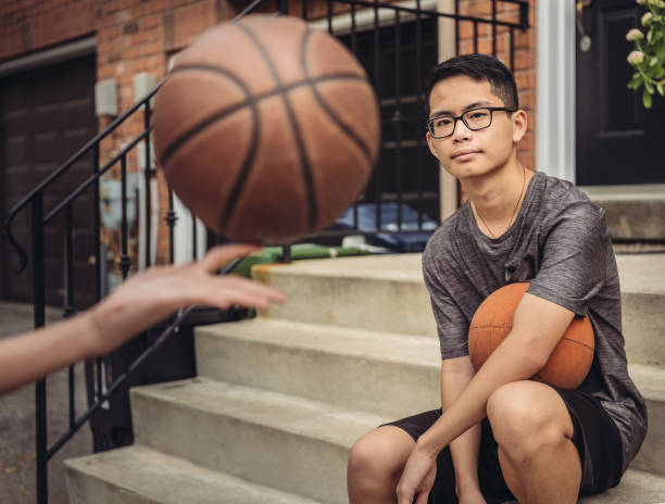 istock Twins at basketball 1034623664