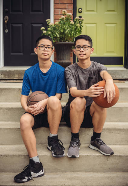 istock Twins at basketball 1034623744