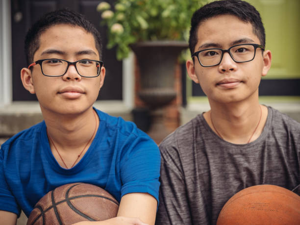 istock Twins at basketball 1034625786