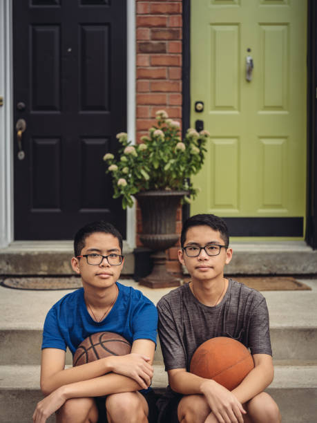 istock Twins at basketball 1034625850