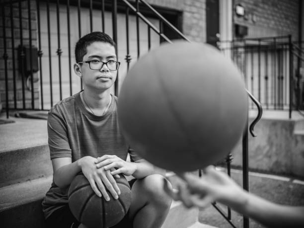 istock Twins at basketball 1034625894