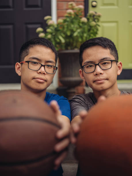 istock Twins at basketball 1034625922