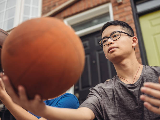istock Twins at basketball 1034625974