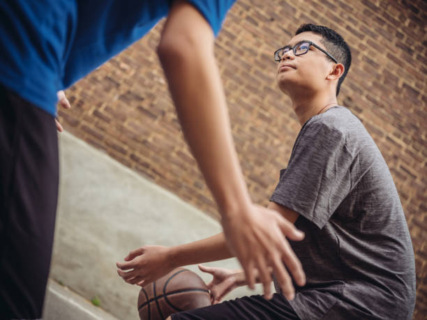 istock Twins at basketball 1034626054