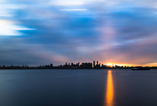istock Downtown Vancouver silhouetted against the setting sun. 1034635162