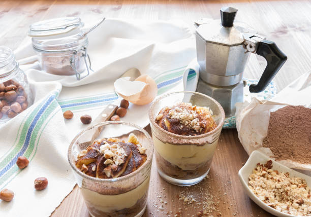 istock Tiramisu on wooden table 1034643896