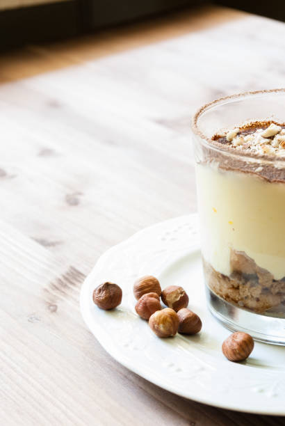 istock Tiramisu on wooden table 1034646438