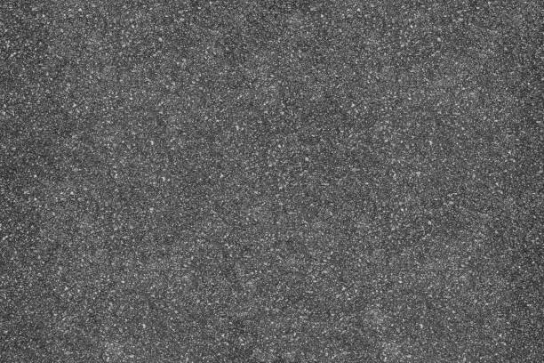 istock Background texture of asphalt road 1034646556