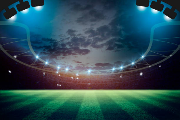 istock lights at night and football stadium 3d rendering. Mixed photos 1034646890