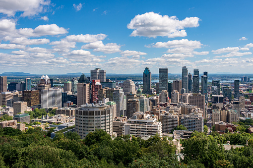 Montreal, CA - 8 September 2018: Montreal skyline from Kondiaronk Belvedere located at the top of the Mont-Royal mountain.