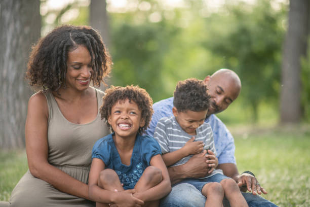 istock Family Sitting Together 1034663556