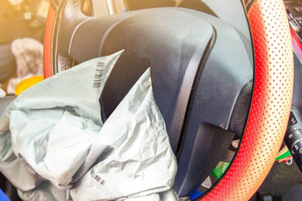 istock Airbag exploded at a car accident,Car crash and airbag working 1034675458