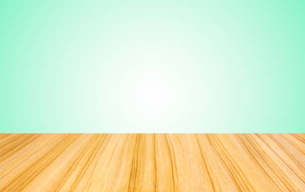 istock perspective wooden floor texture and mint green gradient wall  background 1034675460