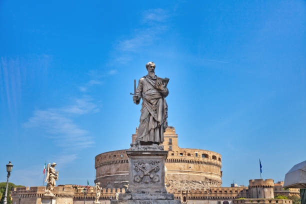 istock Saint Paul Statue standing in front of Castel Sant'angelo in Rome 1034676046